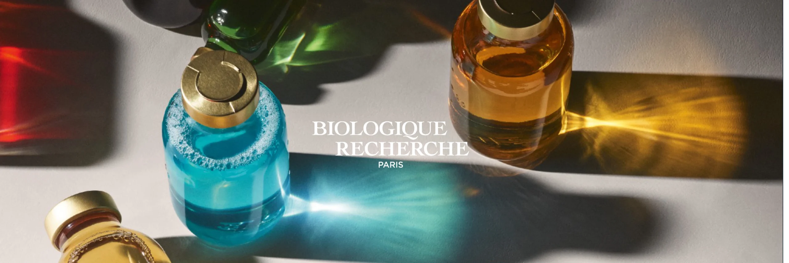 08_coloured_bottles_full_banner